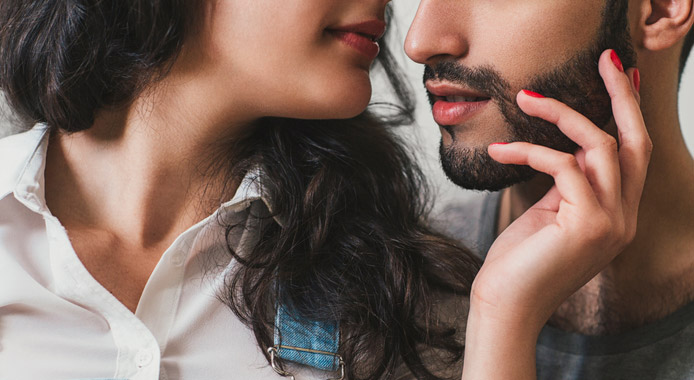 Close up image of a woman and man