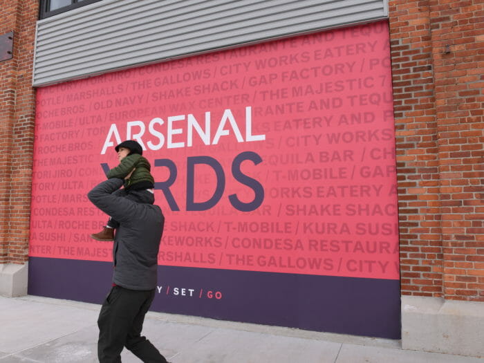 Arsenal Yards graphic on a garage door