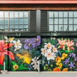 A mural of flowers at Arsenal Yards