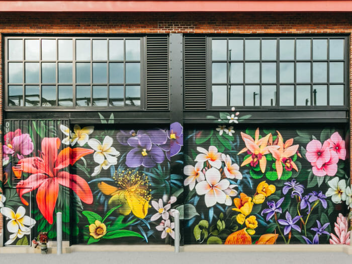 A mural of flowers at Arsenal Yards